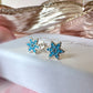 925 sterling silver Blue Glitter Snowflake stud earrings.