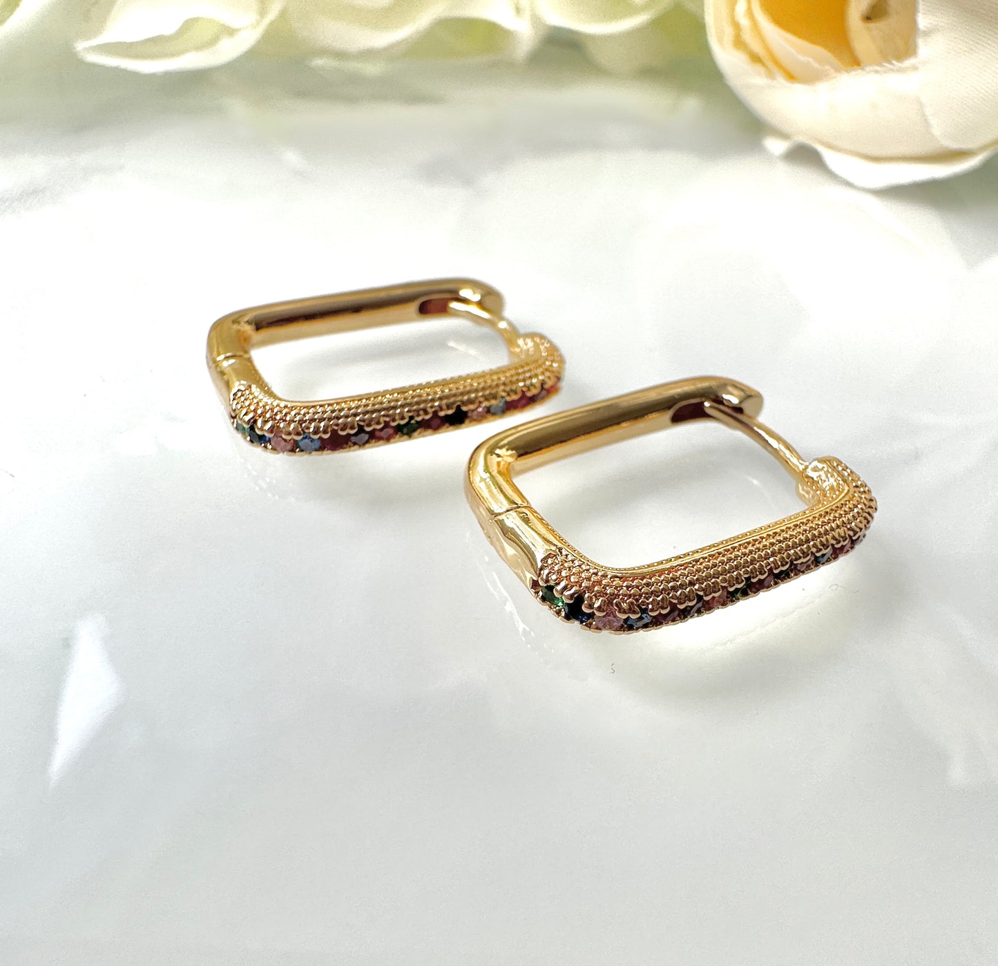 Gold Rainbow stone Rectangle huggie earrings.
