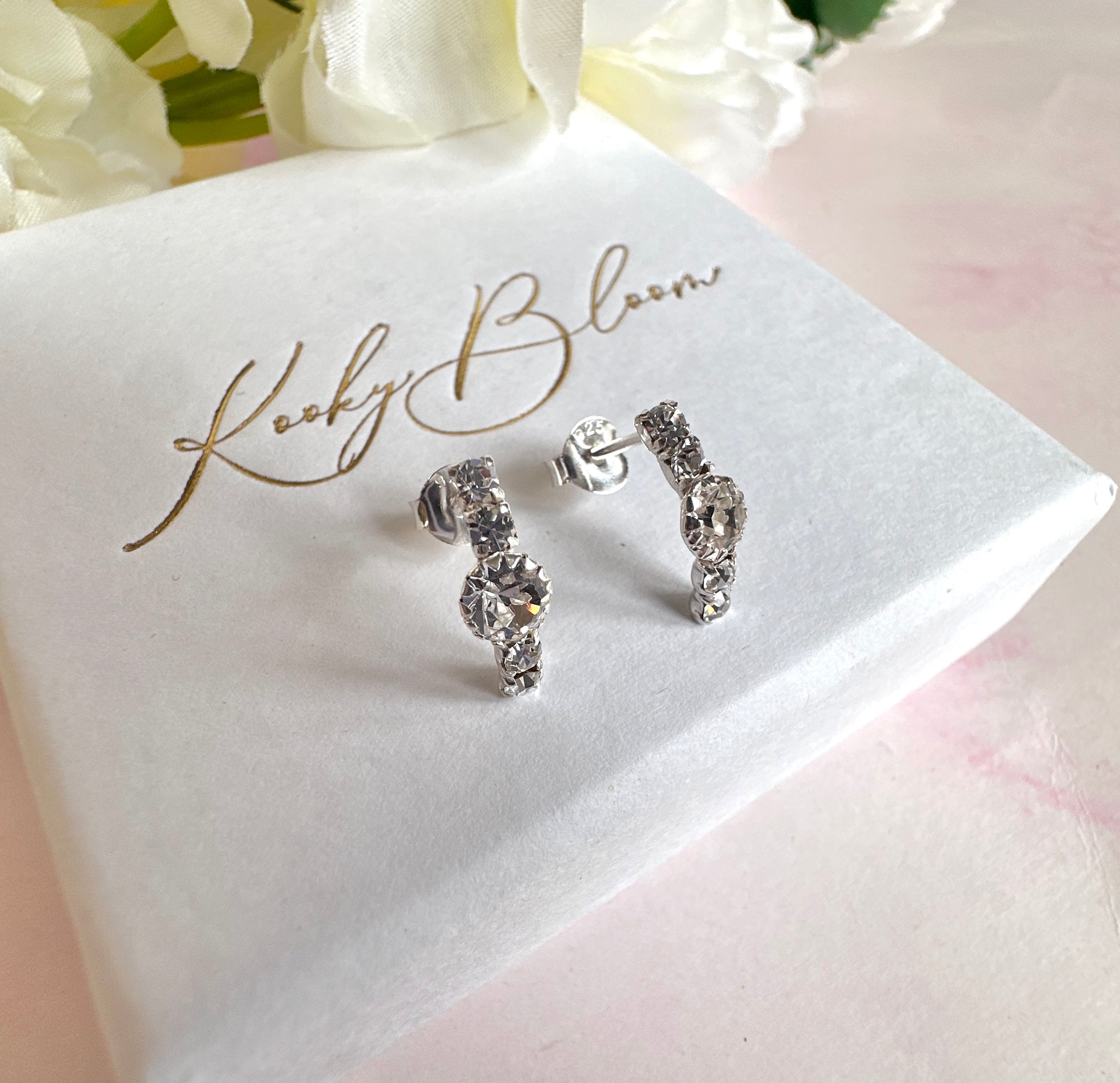 925 sterling silver CZ Curved half hoop stud earrings.