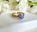Gold forget me not flower adjustable band ring.