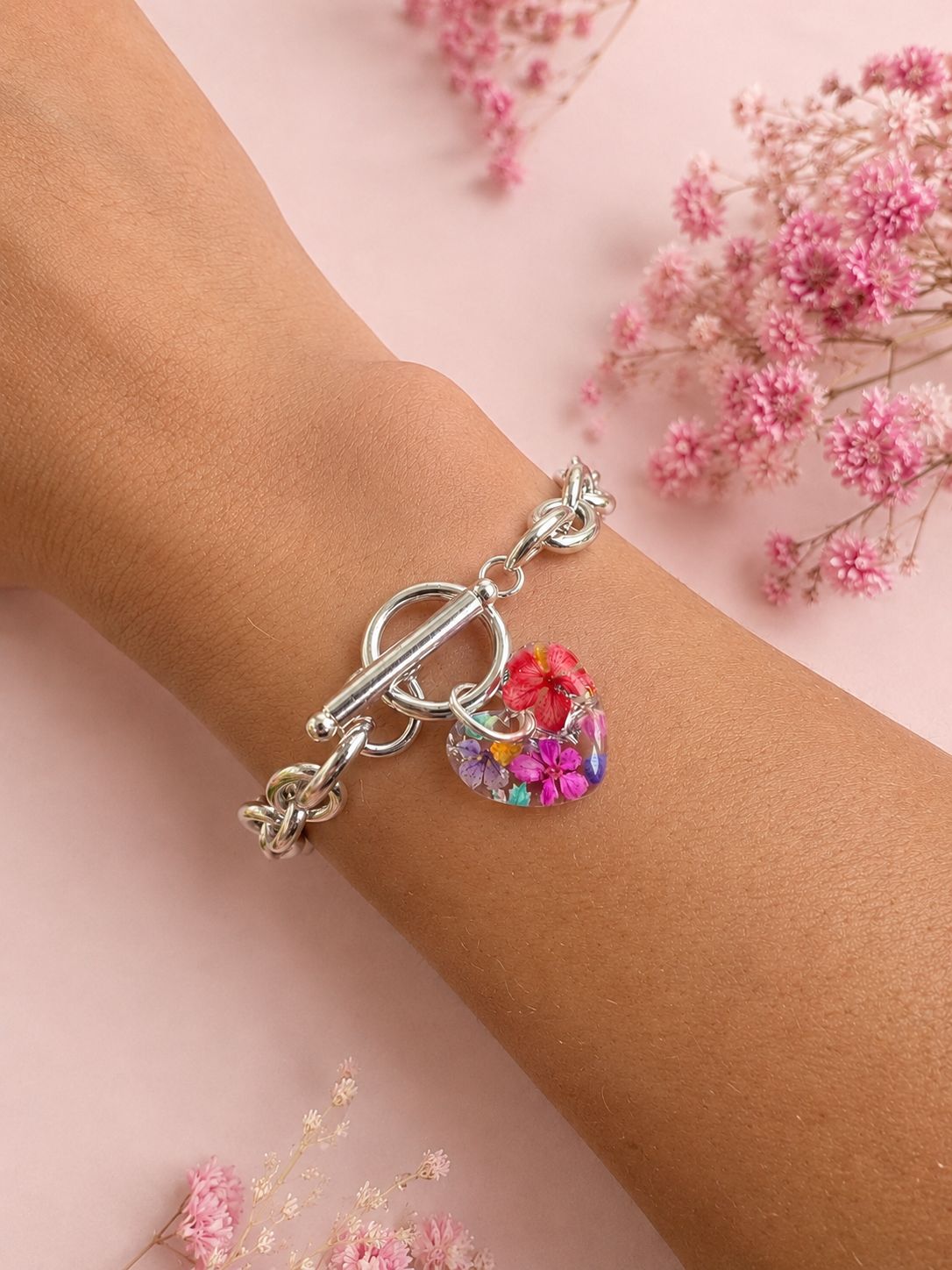 Silver Summer bloom heart toggle clasp bracelet.