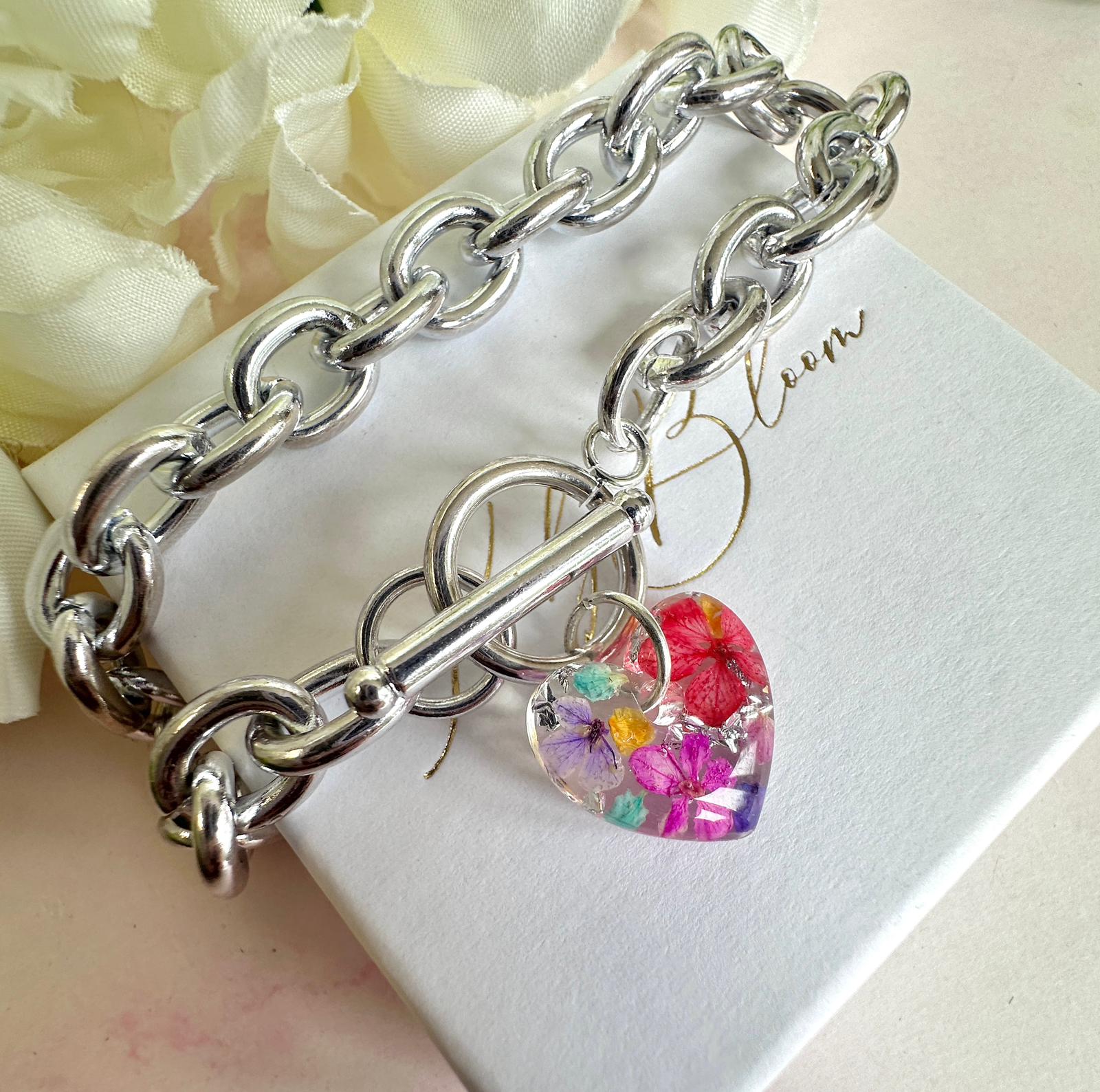 Silver Summer bloom heart toggle clasp bracelet.