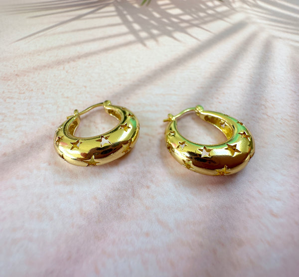 Gold Star Cut out Hoop earrings.