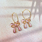 Pink Ribbon Bow Gold Hoop earrings.