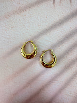 Gold Star Cut out Hoop earrings.