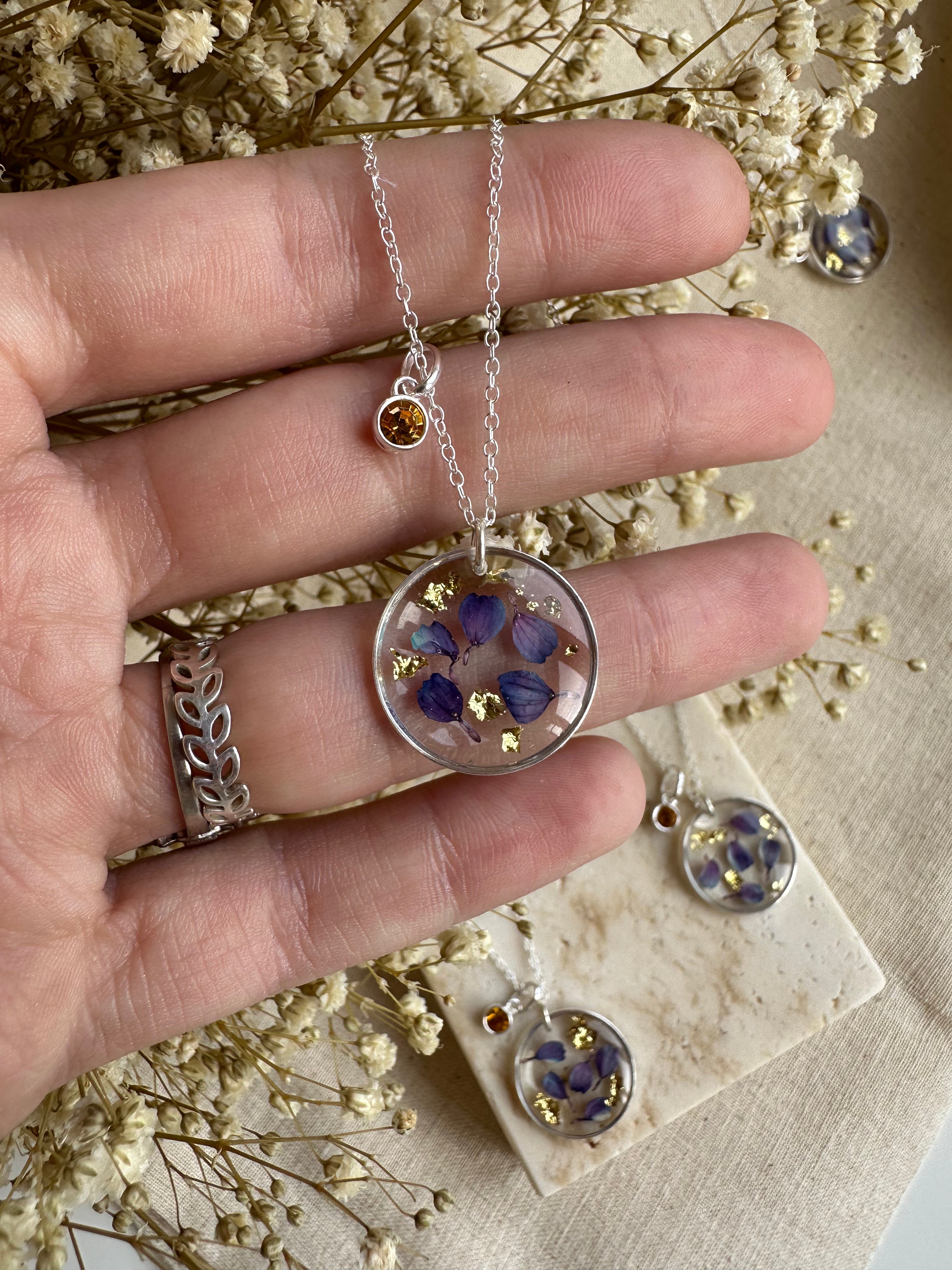 The November Birthstone flower silver necklace.
