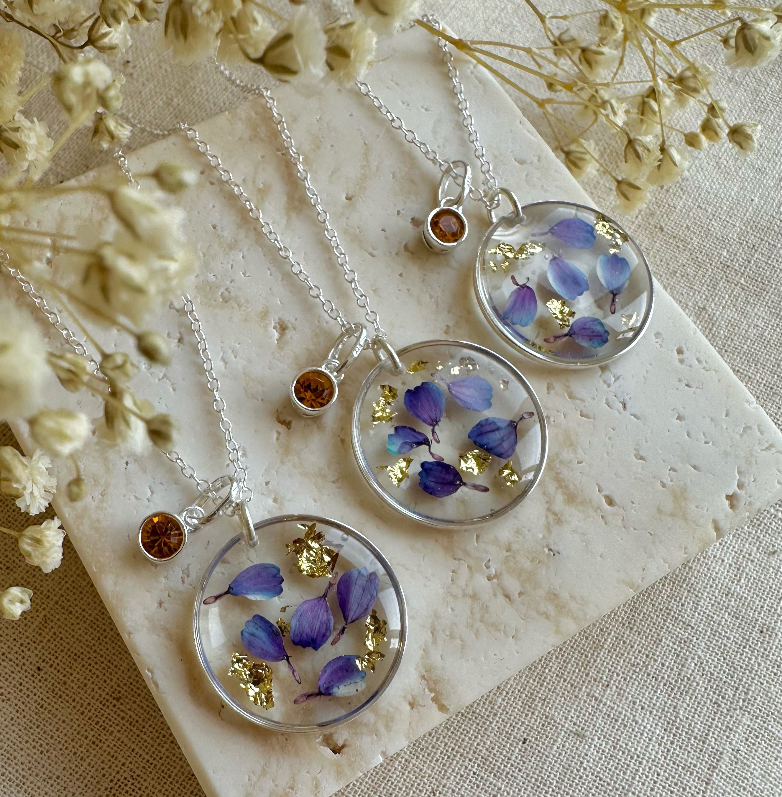 The November Birthstone flower silver necklace.