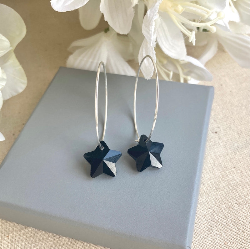 Black glass star sterling silver hoops earrings.