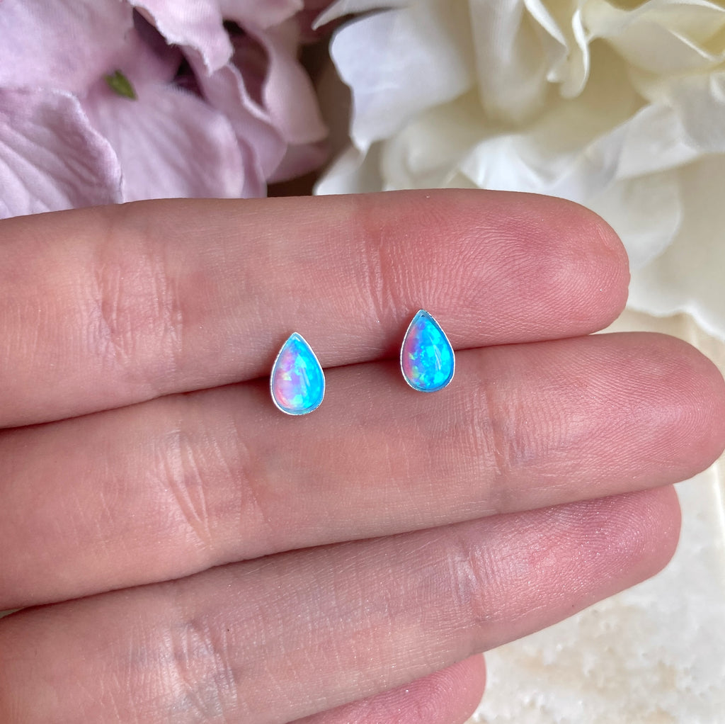 925 sterling silver Blue Opal teardrop stud earrings.
